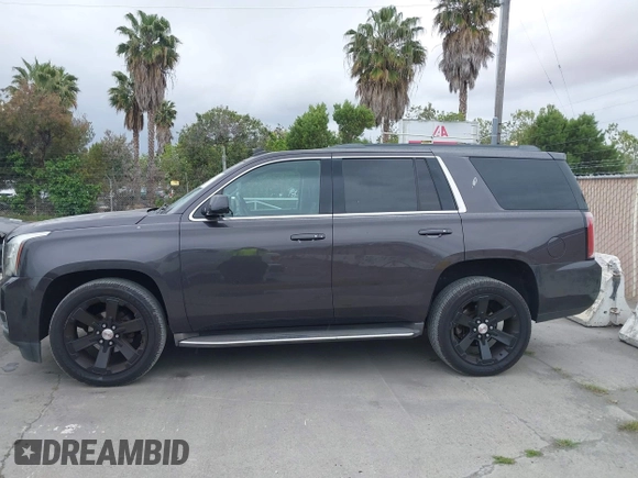 2015 GMC Yukon SLT with VIN 1GKS1BKC6FR245564, listed as a IAAI auction lot 42139295 with 149,088 mi miles. Bid and sale history available at carsss.com. Image 14.
