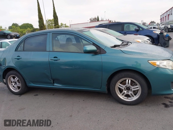 2009 Toyota Corolla with VIN 1NXBU40E39Z047881, listed as a IAAI auction lot 42078719 with 204,258 mi miles. Bid and sale history available at carsss.com. Image 13.