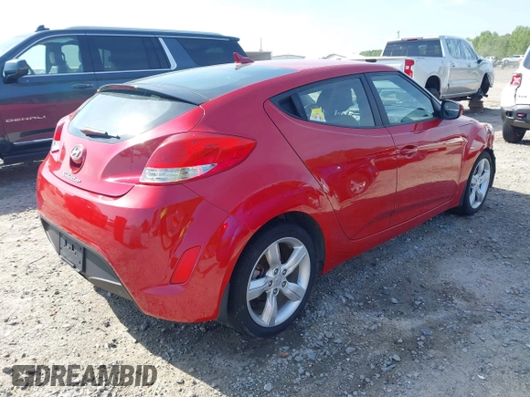 2013 Hyundai Veloster w/Gray Int with VIN KMHTC6AD8DU112810, listed as a IAAI auction lot 42144625 with 142,524 mi miles and . Bid and sale history available at DreamBid. Image 4.
