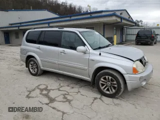 2005 Suzuki XL7 LX z VIN JS3TX92V654108114, wystawiony jako Copart lot #81158564 z przebiegiem 130 384 mil mil oraz Szkoda całkowita • Salvage title. Historia ofert i sprzedaży dostępna na DreamBid. Obrazek 4.