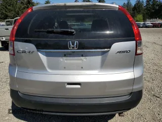 2013 Honda CR-V EX-L z VIN 2HKRM4H75DH693483, wystawiony jako Copart lot #55702115 z przebiegiem 210 135 mil mil oraz Szkody całkowita. Historia ofert i sprzedaży dostępna na DreamBid. Obrazek 6.