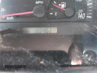 2004 Toyota Camry LE with VIN 4T1BE32K04U319290, listed as a IAAI auction lot 42019125 with 304,666 mi miles. Bid and sale history available at carsss.com. Image 7.