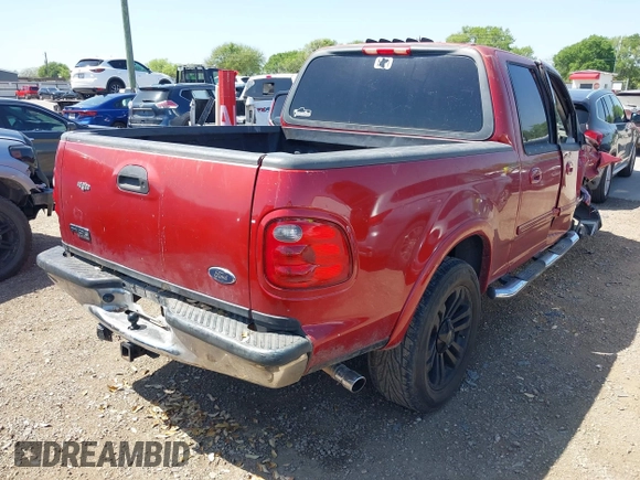 2002 Ford F-150 XLT with VIN 1FTRW07682KC33857, listed as a IAAI auction lot 41870137 with 185,480 mi miles. Bid and sale history available at carsss.com. Image 4.