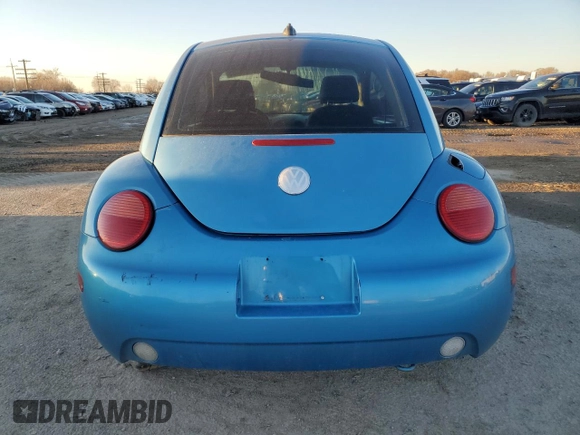 2004 Volkswagen New Beetle Coupe Satellite Blue with VIN 3VWGK31CX4M419900, listed as a Copart auction lot 41627155 with 129,510 mi miles and Salvage Title. Bid and sale history available at carsss.com. Image 6.