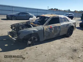 2012 Chrysler 300 z VIN 2C3CCAAG4CH114044, wystawiony jako Copart lot #77582254 z przebiegiem Nie podano mil oraz Szkoda całkowita • Salvage title. Historia ofert i sprzedaży dostępna na DreamBid. Obrazek 1.