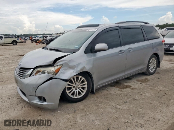 2013 Toyota Sienna XLE AAS with VIN 5TDYK3DC6DS291562, listed as a Copart auction lot 62411965 with 150,505 mi miles and Salvage title. Bid and sale history available at DreamBid. Image 1.