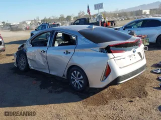 2021 Toyota Prius Prime LE with VIN JTDKAMFP1M3178179, listed as a IAAI auction lot 41233411 with 83,035 mi miles. Bid and sale history available at carsss.com. Image 3.