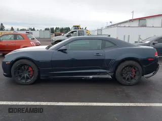 2014 Chevrolet Camaro LT z VIN 2G1FB1E3XE9265155, wystawiony jako IAAI lot #41227609 z przebiegiem 104 786 mil mil oraz . Historia ofert i sprzedaży dostępna na DreamBid. Obrazek 15.