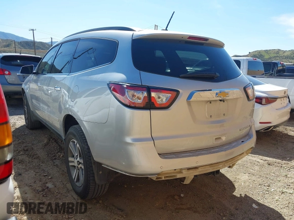 2015 Chevrolet Traverse LT with VIN 1GNKRGKD4FJ243697, listed as a IAAI auction lot 41809476 with 127,830 mi miles and . Bid and sale history available at DreamBid. Image 3.