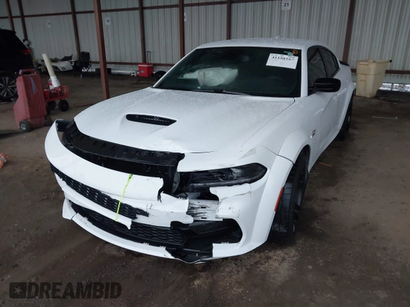 2023 Dodge Charger Scat Pack Widebody with VIN 2C3CDXGJ9PH516473, listed as a IAAI auction lot 41188167 with 38,021 mi miles and . Bid and sale history available at DreamBid. Image 17.