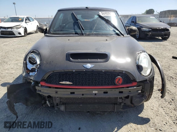 2011 MINI Convertible S с VIN WMWZP3C59BT249133, выставлен на аукционе Copart как лот 56402615 с пробегом 103 809 миль миль и Списание • Salvage title. История ставок и продаж доступна на DreamBid. Изображение 5.