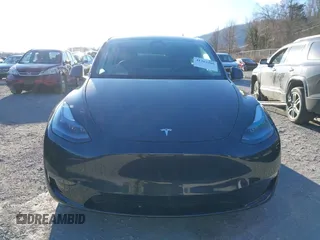 2024 Tesla Model Y Long Range with VIN 7SAYGDEE7RF199673, listed as a IAAI auction lot 41263305 with 3,137 mi miles and . Bid and sale history available at DreamBid. Image 12.
