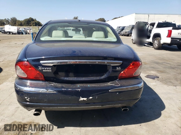 2008 Jaguar X-Type z VIN SAJWA51A38WJ36788, wystawiony jako Copart lot #73103604 z przebiegiem 192 416 mil mil oraz Szkoda całkowita • Salvage title. Historia ofert i sprzedaży dostępna na DreamBid. Obrazek 6.