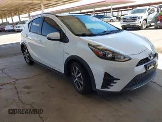 2018 Toyota Prius One with VIN JTDKDTB32J1600004, listed as a IAAI auction lot 42030186 with 61,568 mi miles and . Bid and sale history available at DreamBid. Image 1.