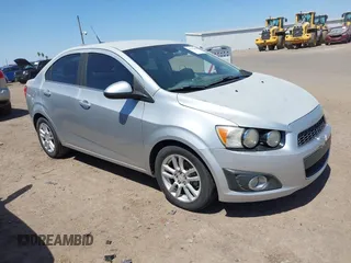 2012 Chevrolet Sonic LT with VIN 1G1JC5SH1C4178839, listed as a IAAI auction lot 42142454 with 143,140 mi miles and . Bid and sale history available at DreamBid. Image 1.