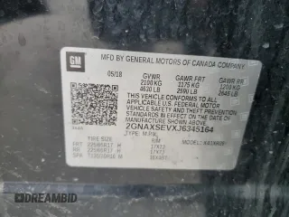 2018 Chevrolet Equinox LT z VIN 2GNAXSEVXJ6345164, wystawiony jako Copart lot #54562235 z przebiegiem 102 810 mil mil oraz Szkoda całkowita • Salvage title. Historia ofert i sprzedaży dostępna na DreamBid. Obrazek 13.