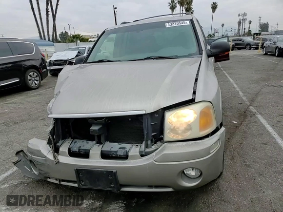 2003 GMC Envoy SLE with VIN 1GKDS13S232236886, listed as a Copart auction lot 43220545 with 58,229 mi miles and Salvage Title. Bid and sale history available at carsss.com. Image 11.