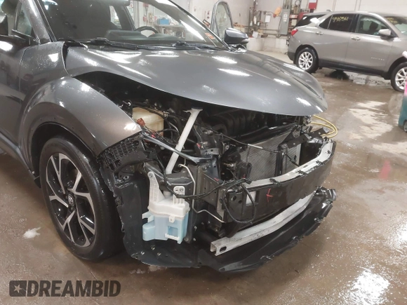 2018 Toyota C-HR XLE with VIN NMTKHMBX4JR022504, listed as a IAAI auction lot 41400793 with 103,439 mi miles and . Bid and sale history available at DreamBid. Image 19.