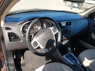 2013 Chrysler 200 Touring with VIN 1C3CCBBB0DN629947, listed as a IAAI auction lot 42216657 with 166,240 mi miles. Bid and sale history available at carsss.com. Image 13.