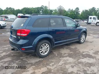 2014 Dodge Journey SXT z VIN 3C4PDCBG8ET126938, wystawiony jako IAAI lot #42526536 z przebiegiem 142 664 mil mil oraz . Historia ofert i sprzedaży dostępna na DreamBid. Obrazek 4.