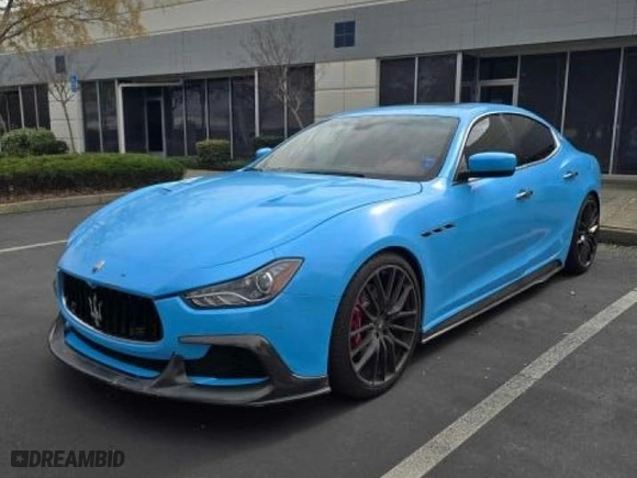 2014 Maserati Ghibli S Q4 with VIN ZAM57RTA7E1089301, listed as a Copart auction lot 54070585 with 59,787 mi miles and Salvage Title. Bid and sale history available at carsss.com. Image 2.