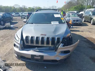 2016 Jeep Cherokee 75th Anniversary with VIN 1C4PJLCB5GW287420, listed as a IAAI auction lot 41984043 with 145,577 mi miles. Bid and sale history available at carsss.com. Image 12.