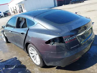2017 Tesla Model S 100D with VIN 5YJSA1E22HF210635, listed as a IAAI auction lot 41854125 with 112,323 mi miles. Bid and sale history available at carsss.com. Image 3.