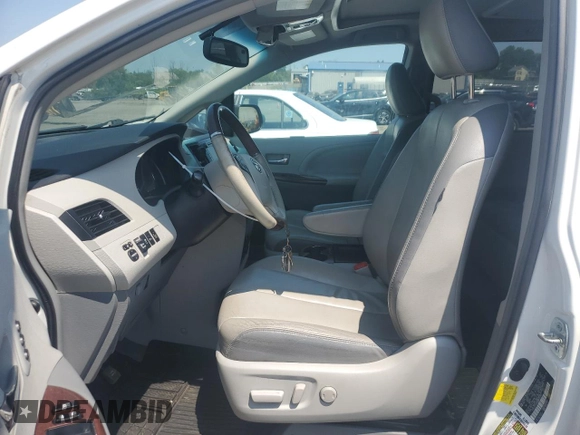 2013 Toyota Sienna XLE with VIN 5TDDK3DC1DS054265, listed as a Copart auction lot 59713835 with 206,197 mi miles and Salvage title. Bid and sale history available at DreamBid. Image 7.