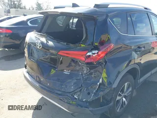 2016 Toyota RAV4 XLE with VIN 2T3RFREV6GW459313, listed as a IAAI auction lot 42074337 with 149,914 mi miles and . Bid and sale history available at DreamBid. Image 6.