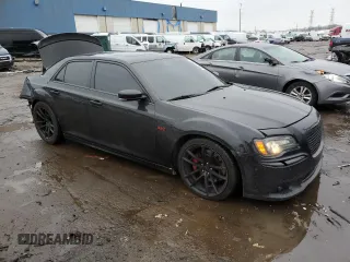 2012 Chrysler 300 SRT8 with VIN 2C3CCAFJ0CH801090, listed as a Copart auction lot 86537394 with 126,439 mi miles and Clean Title. Bid and sale history available at carsss.com. Image 4.