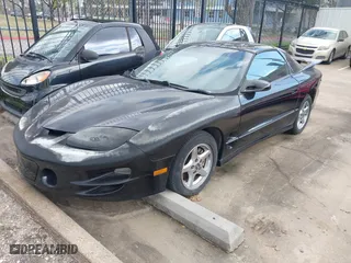 2000 Pontiac Firebird Formula with VIN 2G2FV22G1Y2104657, listed as a IAAI auction lot 41510589 with 1 mi miles. Bid and sale history available at carsss.com. Image 2.