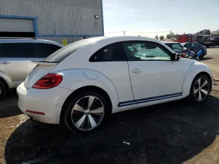 2012 Volkswagen Beetle 2.0T Turbo w/Sun/Snd/Nav PZEV with VIN 3VWVA7AT4CM654695, listed as a Copart auction lot 52117685 with 107,203 mi miles and Clean Title. Bid and sale history available at carsss.com. Image 3.