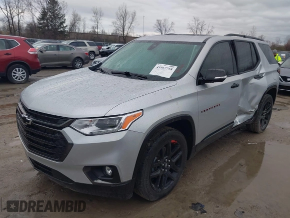 2020 Chevrolet Traverse Premier with VIN 1GNEVKKW4LJ284338, listed as a IAAI auction lot 41912758 with 74,496 mi miles and . Bid and sale history available at DreamBid. Image 2.
