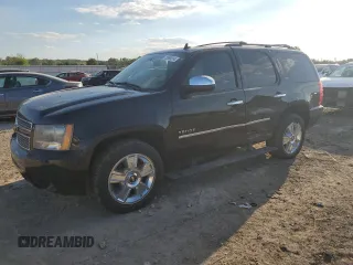 2010 Chevrolet Tahoe LTZ with VIN 1GNUKCE00AR105129, listed as a Copart auction lot 72955014 with 197,431 mi miles and Salvage title. Bid and sale history available at DreamBid. Image 1.