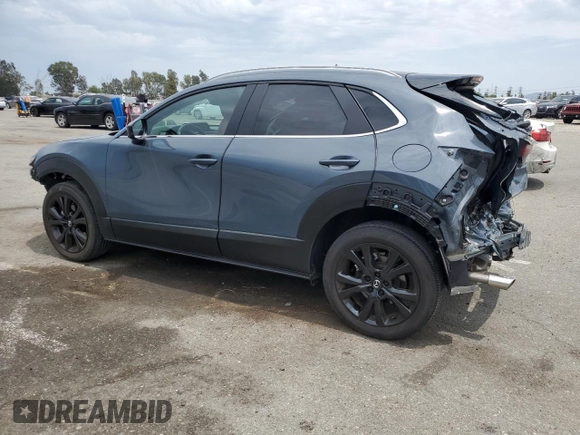 2023 Mazda CX-30 S Carbon Edition with VIN 3MVDMBCM5PM560912, listed as a Copart auction lot 59174445 with 5,247 mi miles and Salvage title. Bid and sale history available at DreamBid. Image 2.