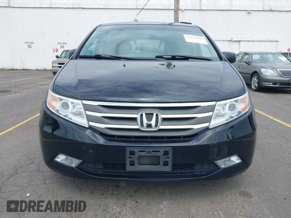 2012 Honda Odyssey Touring with VIN 5FNRL5H93CB121190, listed as a IAAI auction lot 42223998 with 154,358 mi miles and . Bid and sale history available at DreamBid. Image 17.