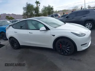 2023 Tesla Model Y Performance with VIN 7SAYGDEFXPF589477, listed as a IAAI auction lot 41936981 with 28,993 mi miles and . Bid and sale history available at DreamBid. Image 14.