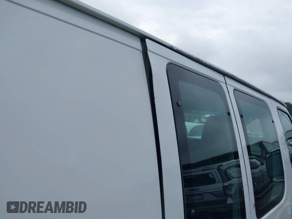 2011 Ford Econoline Cargo Commercial with VIN 1FTNE2EL3BDB39671, listed as a IAAI auction lot 42710914 with 123,621 mi miles and . Bid and sale history available at DreamBid. Image 13.