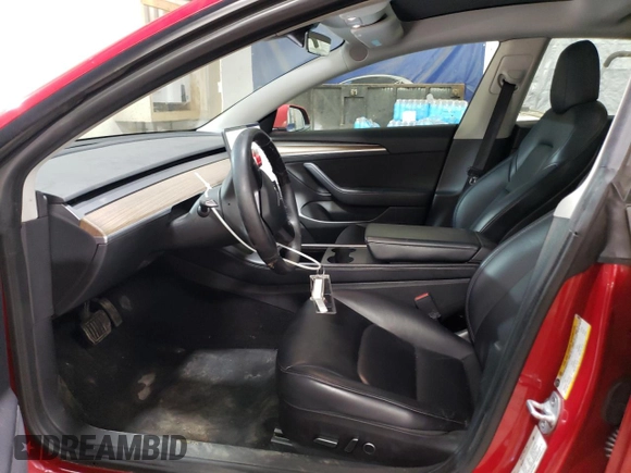 2022 Tesla Model 3 with VIN 5YJ3E1EA8NF289661, listed as a Copart auction lot 52350675 with 153,797 mi miles and Salvage Title. Bid and sale history available at DreamBid. Image 7.