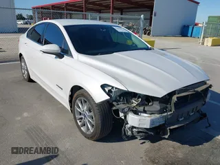 2017 Ford Fusion Hybrid SE with VIN 3FA6P0LU5HR129986, listed as a IAAI auction lot 42699893 with 87,119 mi miles and . Bid and sale history available at DreamBid. Image 1.