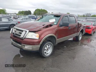 2005 Ford F-150 XLT with VIN 1FTPW14545KC40740, listed as a IAAI auction lot 41932653 with 164,641 mi miles. Bid and sale history available at carsss.com. Image 2.