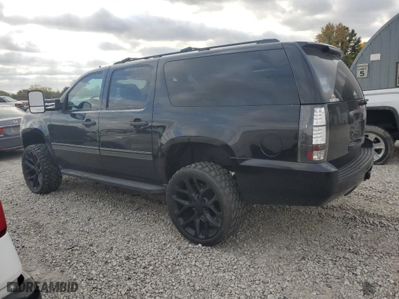 2009 Chevrolet Suburban LT w/2LT with VIN 1GNFK263X9R278809, listed as a Copart auction lot 77856924 with 139,744 mi miles and Salvage Title. Bid and sale history available at carsss.com. Image 2.