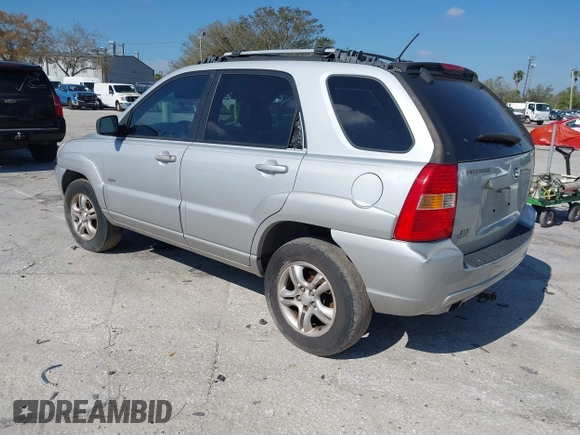 2005 Kia Sportage LX with VIN KNDJE723957128130, listed as a IAAI auction lot 41646193 with 188,142 mi miles and . Bid and sale history available at carsss.com. Image 3.