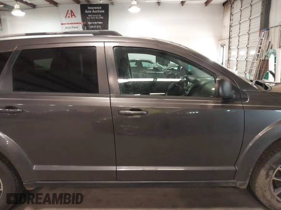 2017 Dodge Journey SE with VIN 3C4PDCAB2HT684231, listed as a IAAI auction lot 41189943 with 201,549 mi miles and . Bid and sale history available at DreamBid. Image 13.