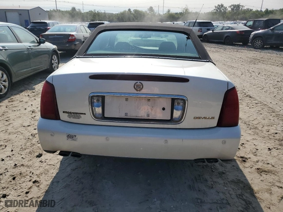 2001 Cadillac DeVille with VIN 1G6KD54YX1U158322, listed as a Copart auction lot 71097694 with 64,731 mi miles and Clean Title. Bid and sale history available at carsss.com. Image 6.