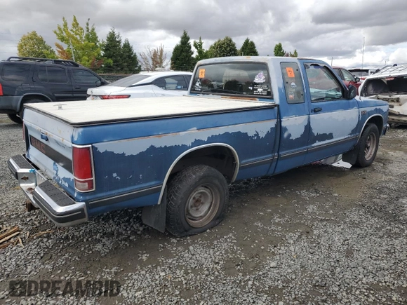 1990 GMC Sonoma z VIN 1GTCS19Z4L8502532, wystawiony jako Copart lot #71074514 z przebiegiem 148 195 mil mil oraz Szkody całkowita. Historia ofert i sprzedaży dostępna na DreamBid. Obrazek 3.