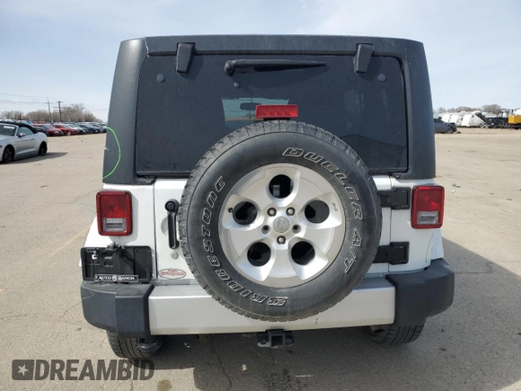 2015 Jeep Wrangler Unlimited Sahara with VIN 1C4BJWEG7FL768712, listed as a Copart auction lot 49963335 with 100,053 mi miles and Salvage Title. Bid and sale history available at carsss.com. Image 6.