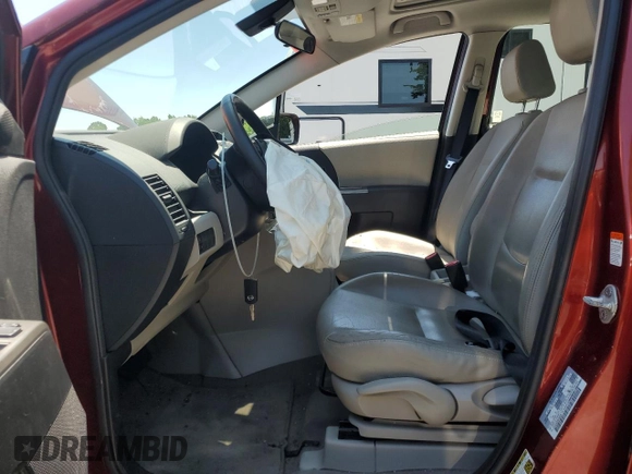 2009 Mazda 5 Grand Touring with VIN JM1CR293090348566, listed as a Copart auction lot 59270145 with 75,966 mi miles and Salvage title. Bid and sale history available at DreamBid. Image 7.