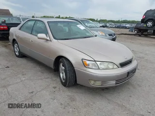 1998 Lexus ES 300 with VIN JT8BF28G2W5033533, listed as a IAAI auction lot 42209797 with 231,833 mi miles and . Bid and sale history available at DreamBid. Image 1.