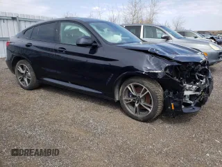 2021 BMW X4 xDrive30i with VIN 5UX2V1C07M9G61961, listed as a Copart auction lot 49663833 with 33,465 mi miles. Bid and sale history available at carsss.com. Image 4.
